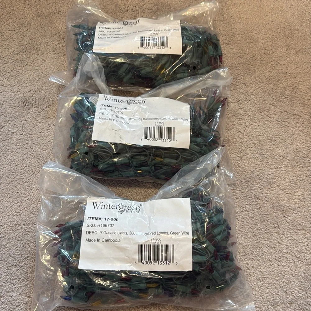 NEW in BAG Wintergreen Lighting  9' Garland, 300 Multicolored Lights- Green Wire